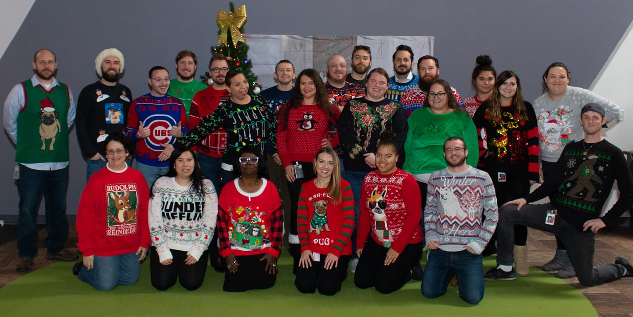 Employees participating in Holiday Ugly Sweater Contest in Northbrook